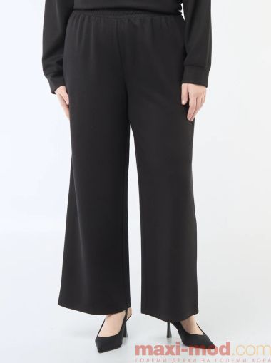 Широки панталони от оребрена еластична материя 