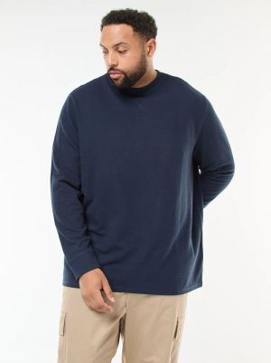 Лек пуловер с оребрена плетка и кръгло деколте 