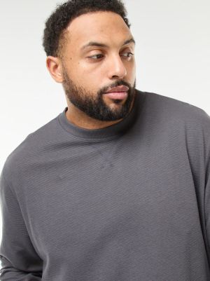 Лек пуловер с оребрена плетка и кръгло деколте 