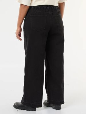 Дамски дънки с широки крачоли и ластик в колана