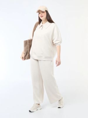 Широки панталони от оребрена еластична материя 